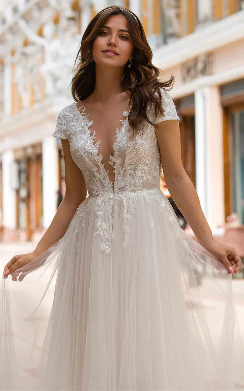 A Line Plunging Neckline Tulle Sweep Train Wedding Dress with Appliques