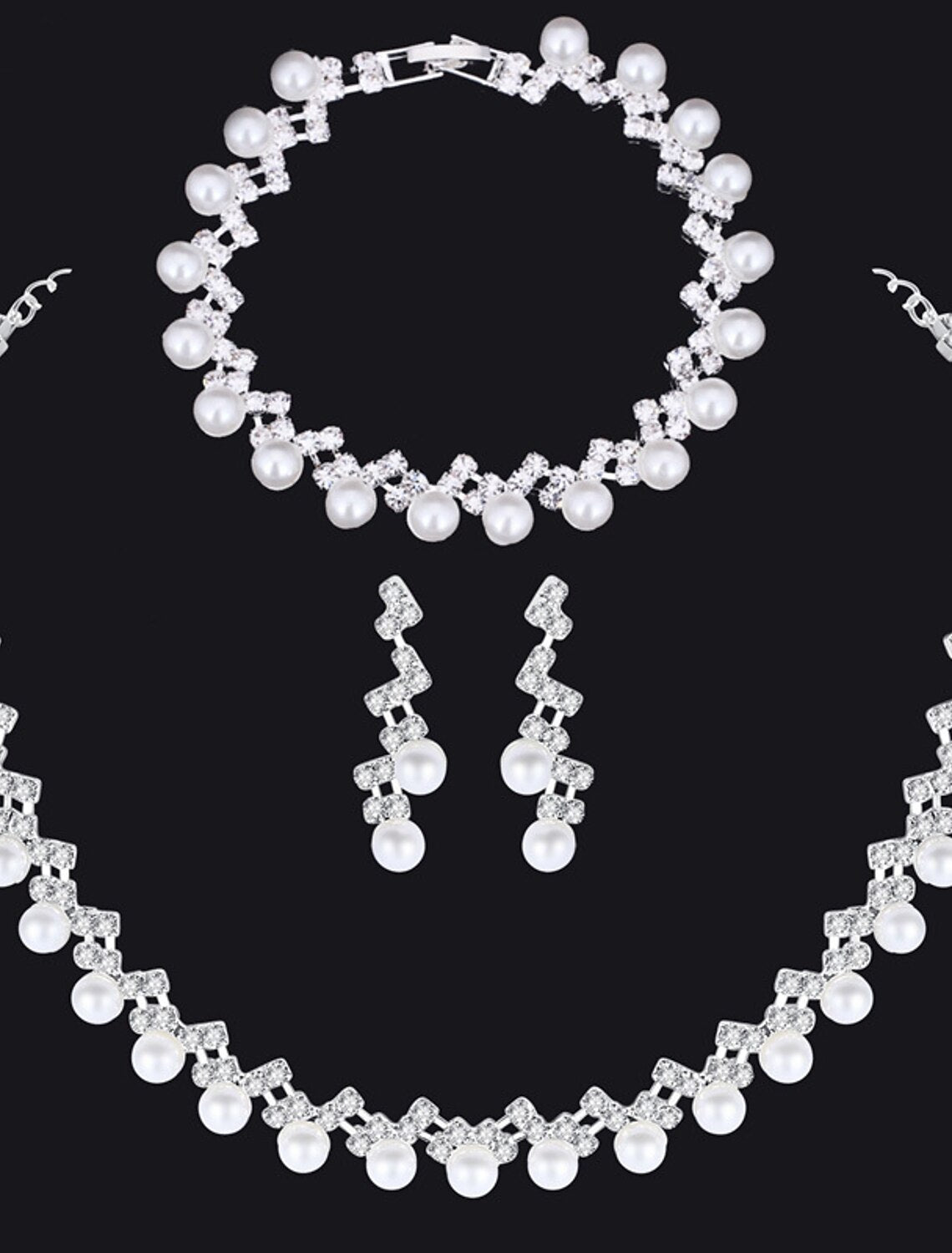 Bride wearing the imitation pearl necklace, bracelet, and earrings.