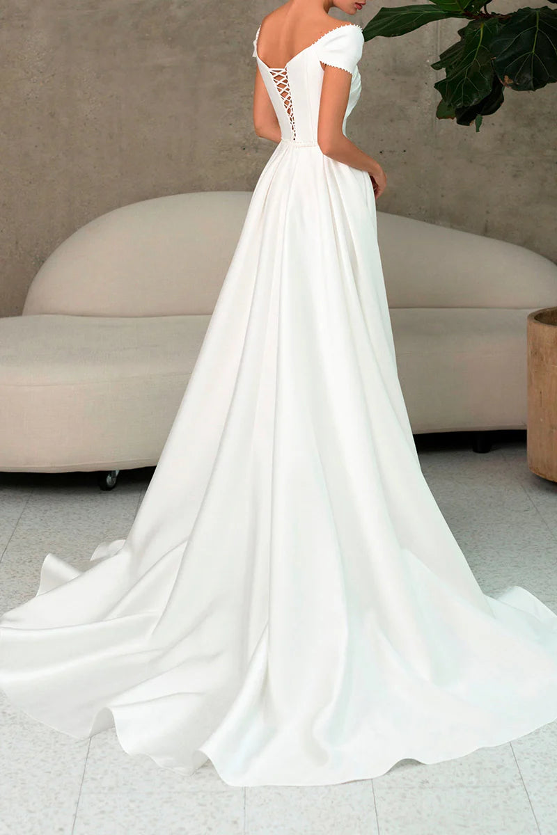 Close-up of the sweetheart neckline and bodice details of an A-line wedding dress.