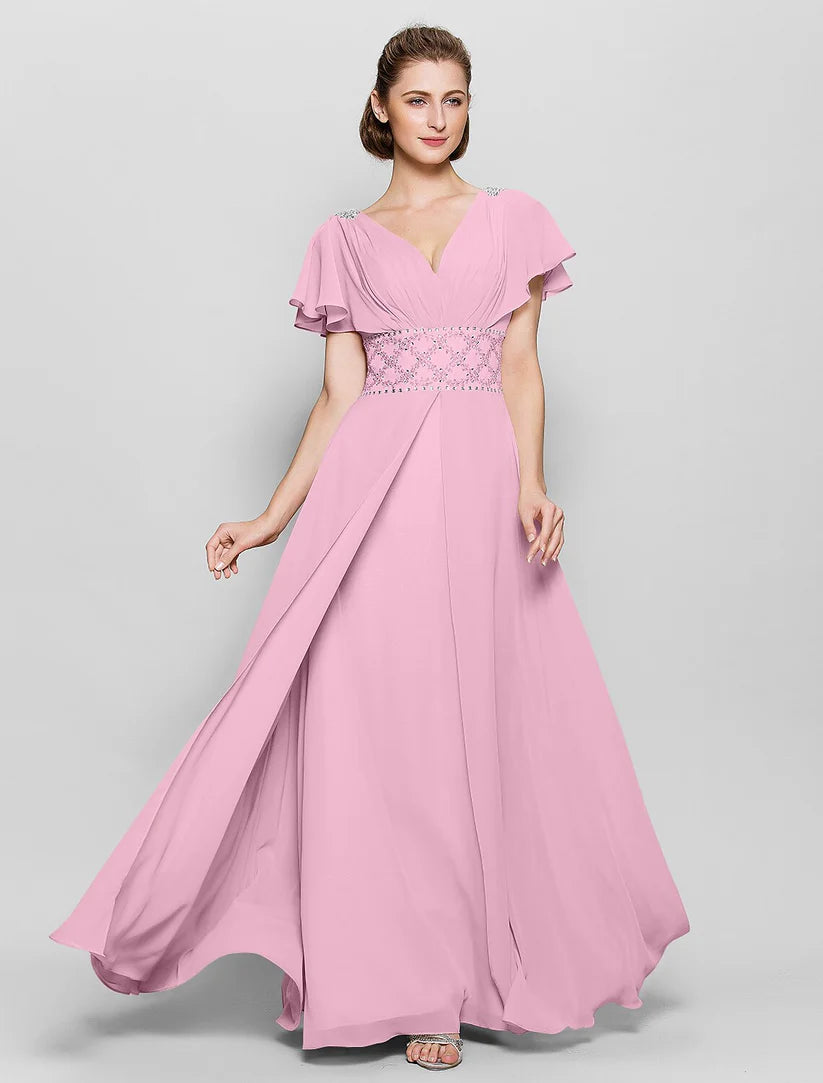 Close-up of the V-neckline and short sleeve detail on the mother of the bride gown.