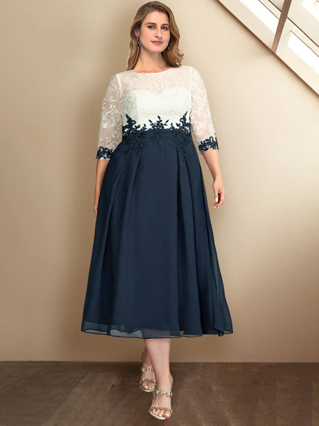 Elegant A-Line plus size Mother of the Bride dress with jewel neck and half sleeves.