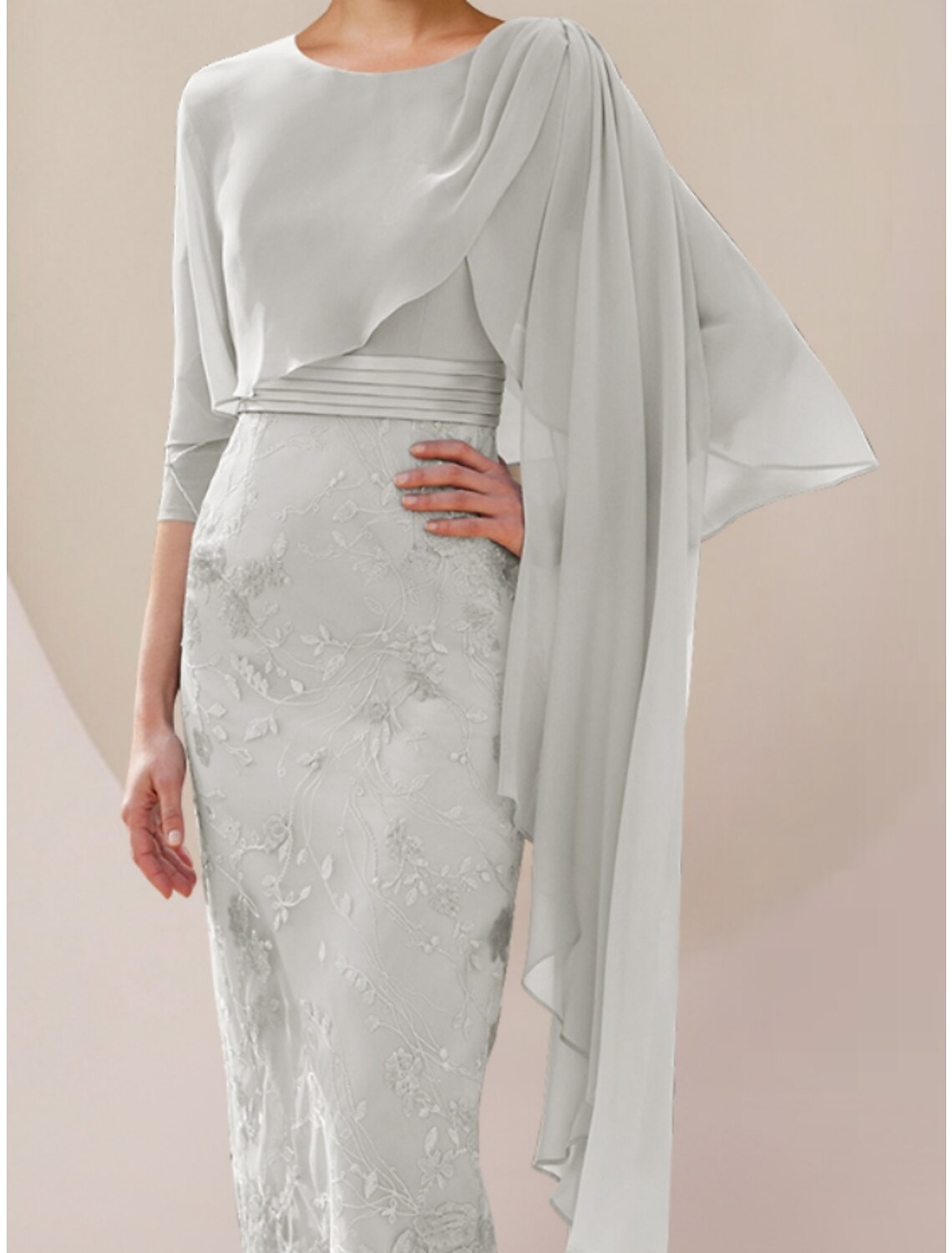 Tea length chiffon lace dress with ruching, suitable for wedding guests.