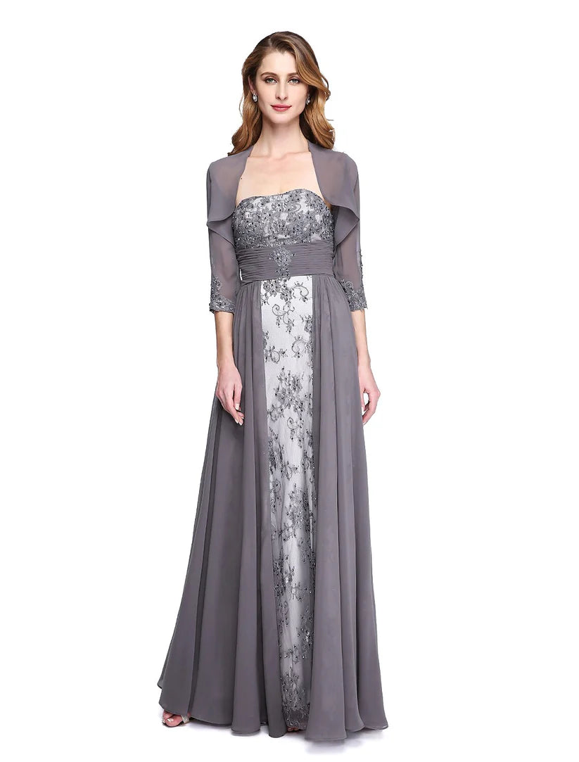Woman in A-line strapless Mother of the Bride dress with matching wrap.