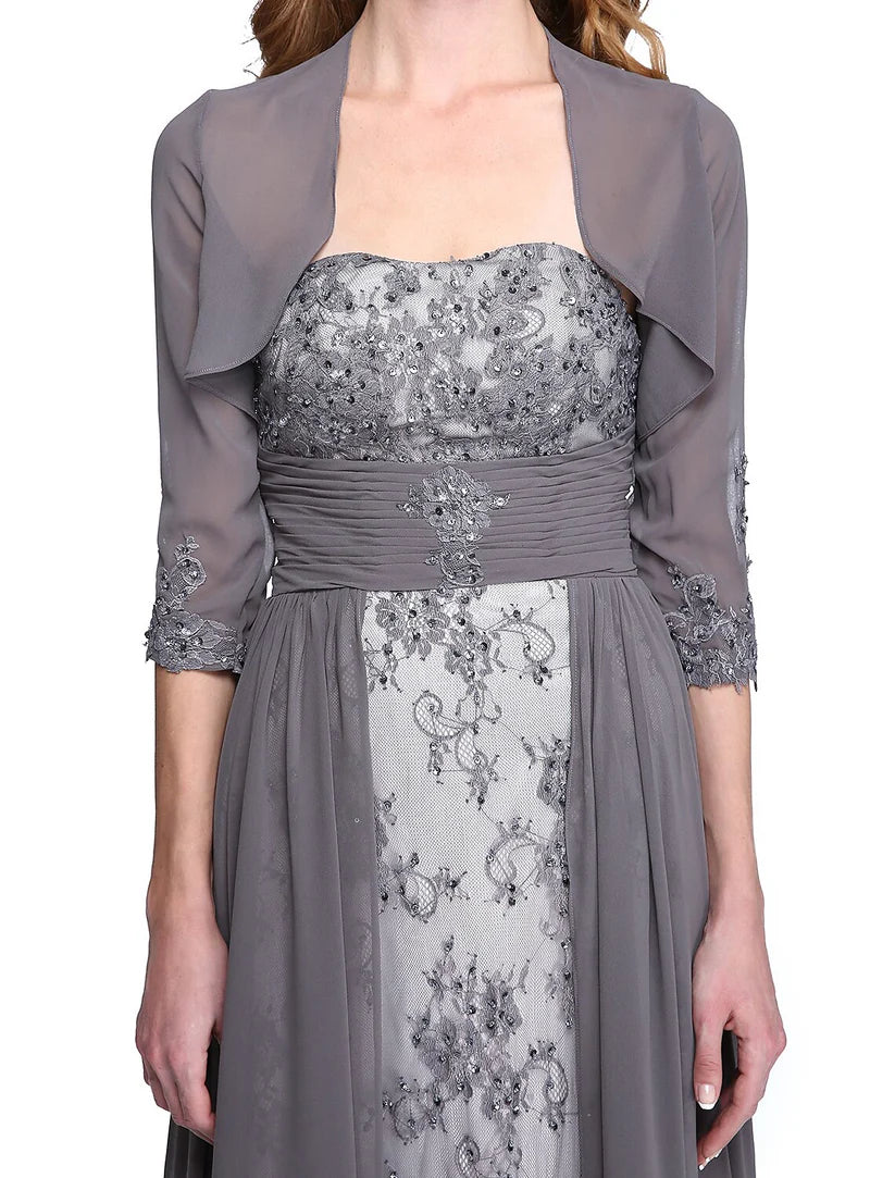 Close-up of beaded lace and ruched detailing on the strapless A-line dress.