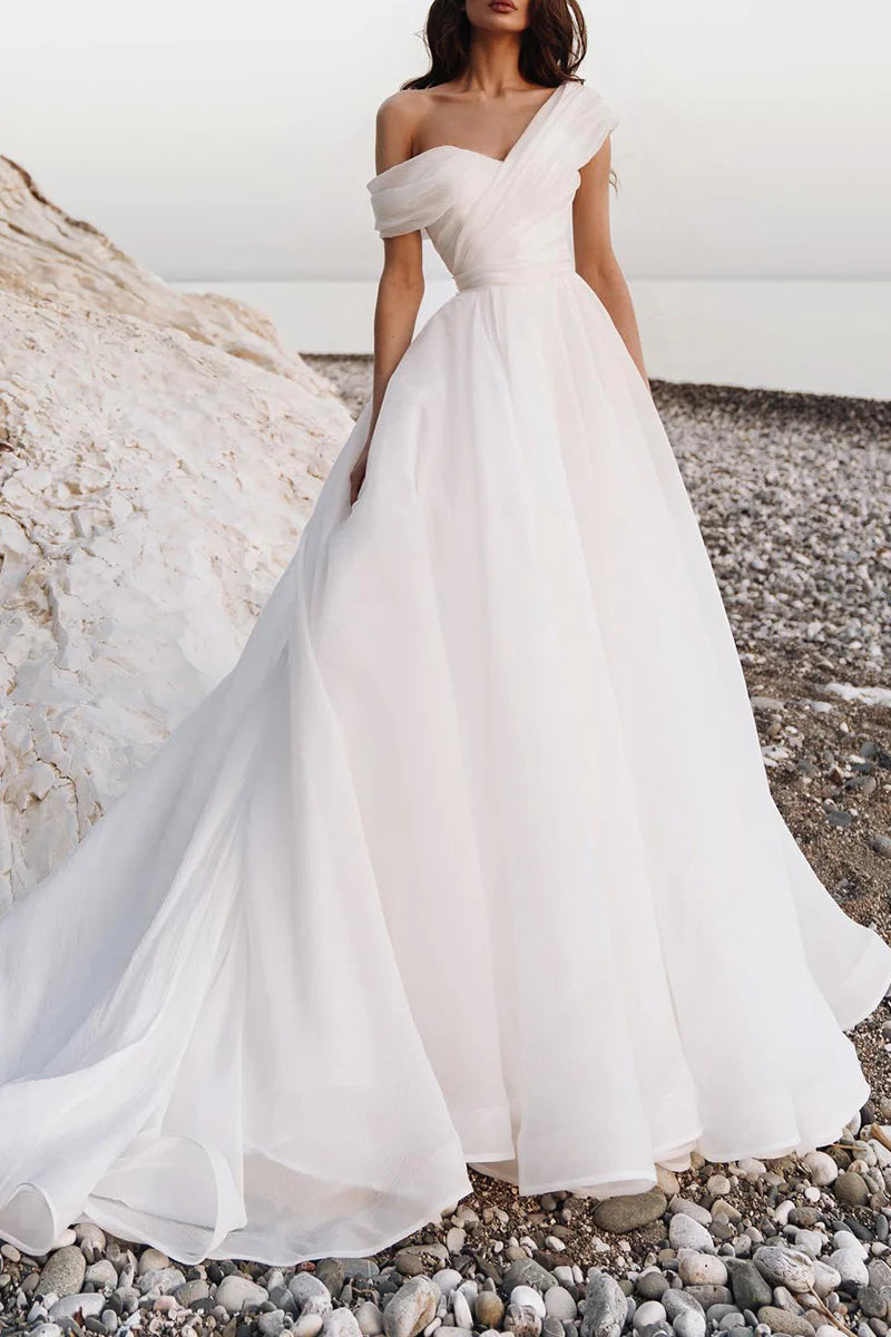 A-line one-shoulder organza wedding dress, front view.