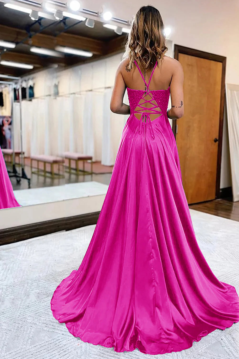 Elegant A-Line satin prom dress with intricate appliques and a high slit.