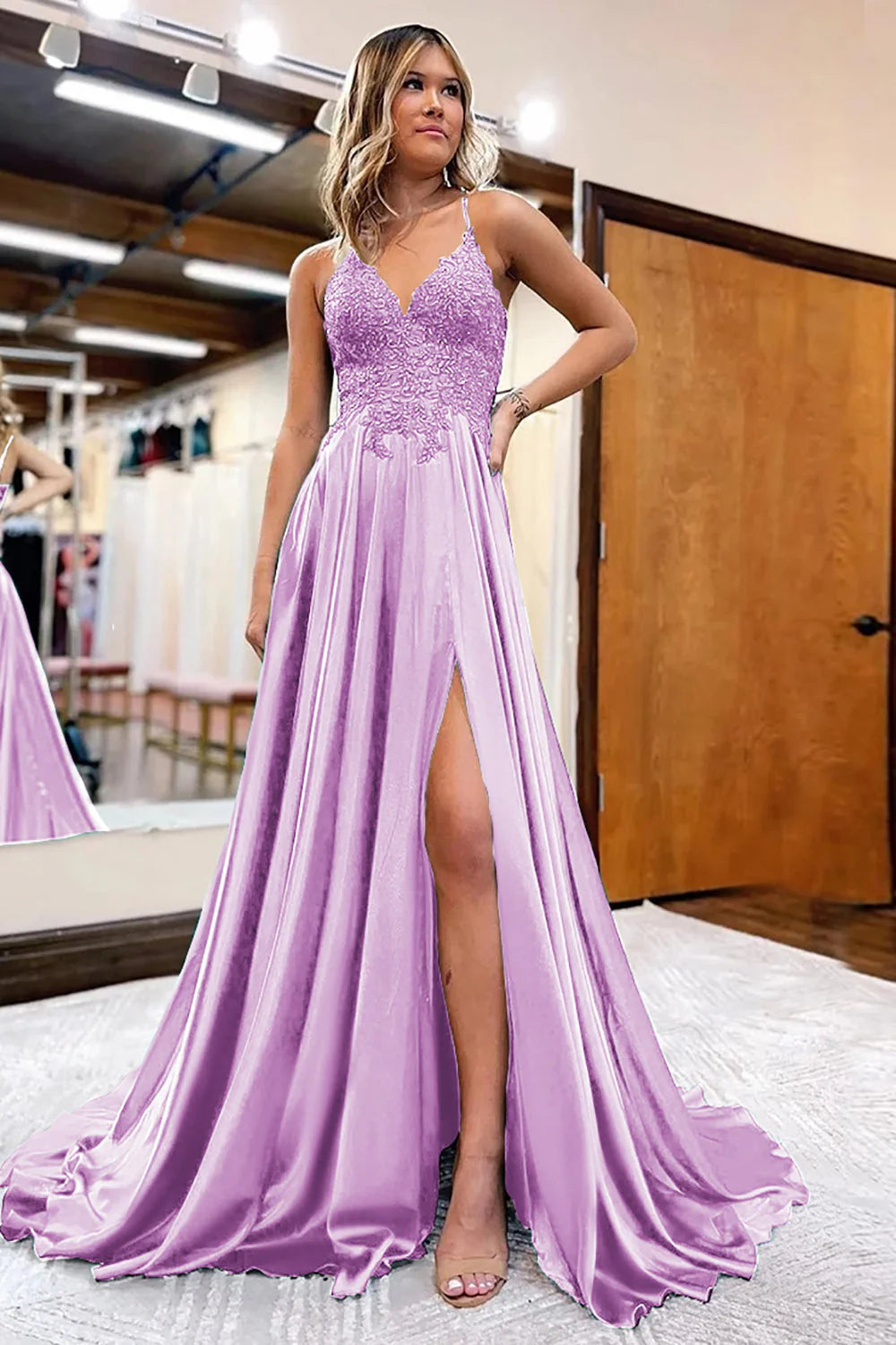 Close-up of appliques detail on an A-Line satin prom dress.