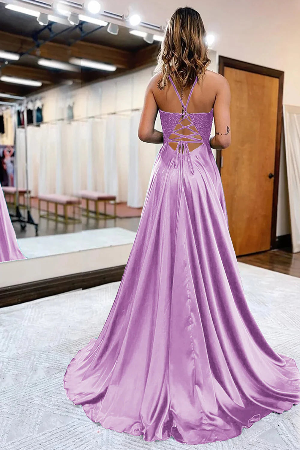 Back view of an A-Line satin prom dress, showcasing the elegant silhouette.