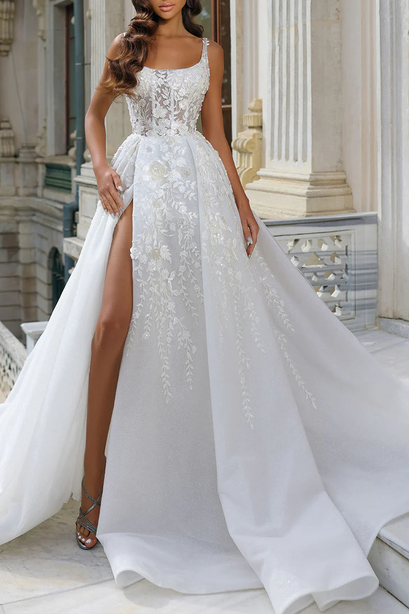Model wearing an A-line square neck wedding dress with lace appliques, high split, and court train.
