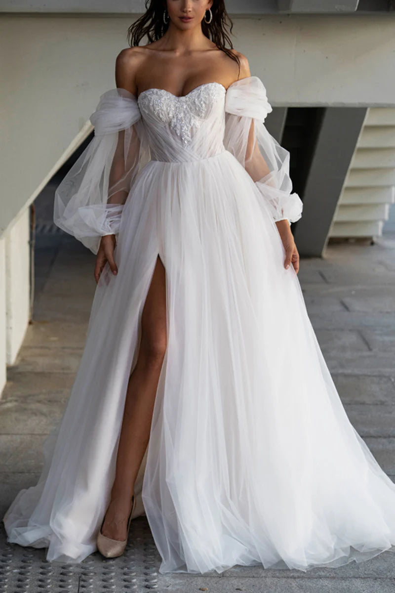 Front view of an A-line sweetheart applique casual wedding dress.