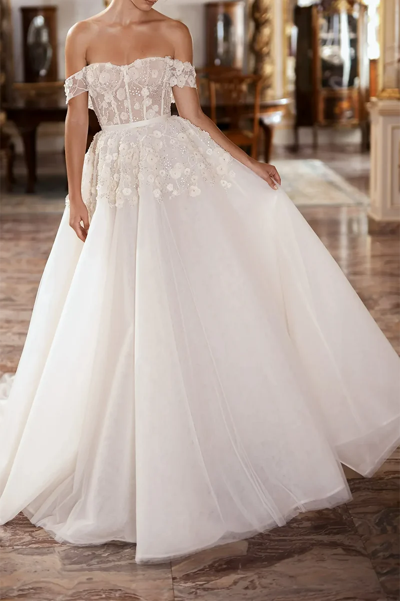 Elegant A-line wedding dress with sweetheart neckline and court train.