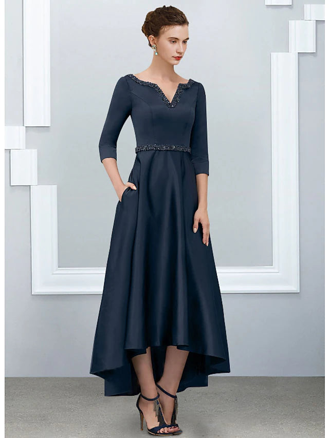 Back view of the elegant A-Line Mother of the Bride dress with pleats.