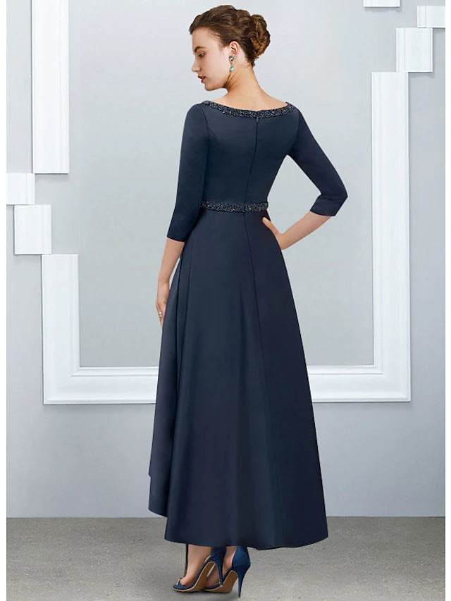 Close-up of the satin fabric and V-neckline on the Mother of the Bride dress.