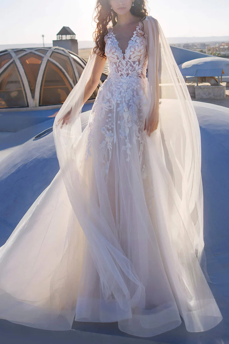 Elegant A-line V-neck wedding dress with delicate lace appliques, front view.