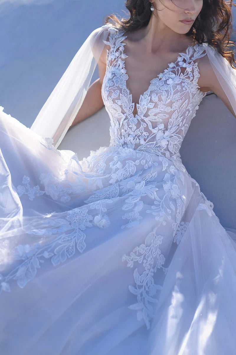 Back view of the A-line V-neck wedding dress, showing the flowing skirt.