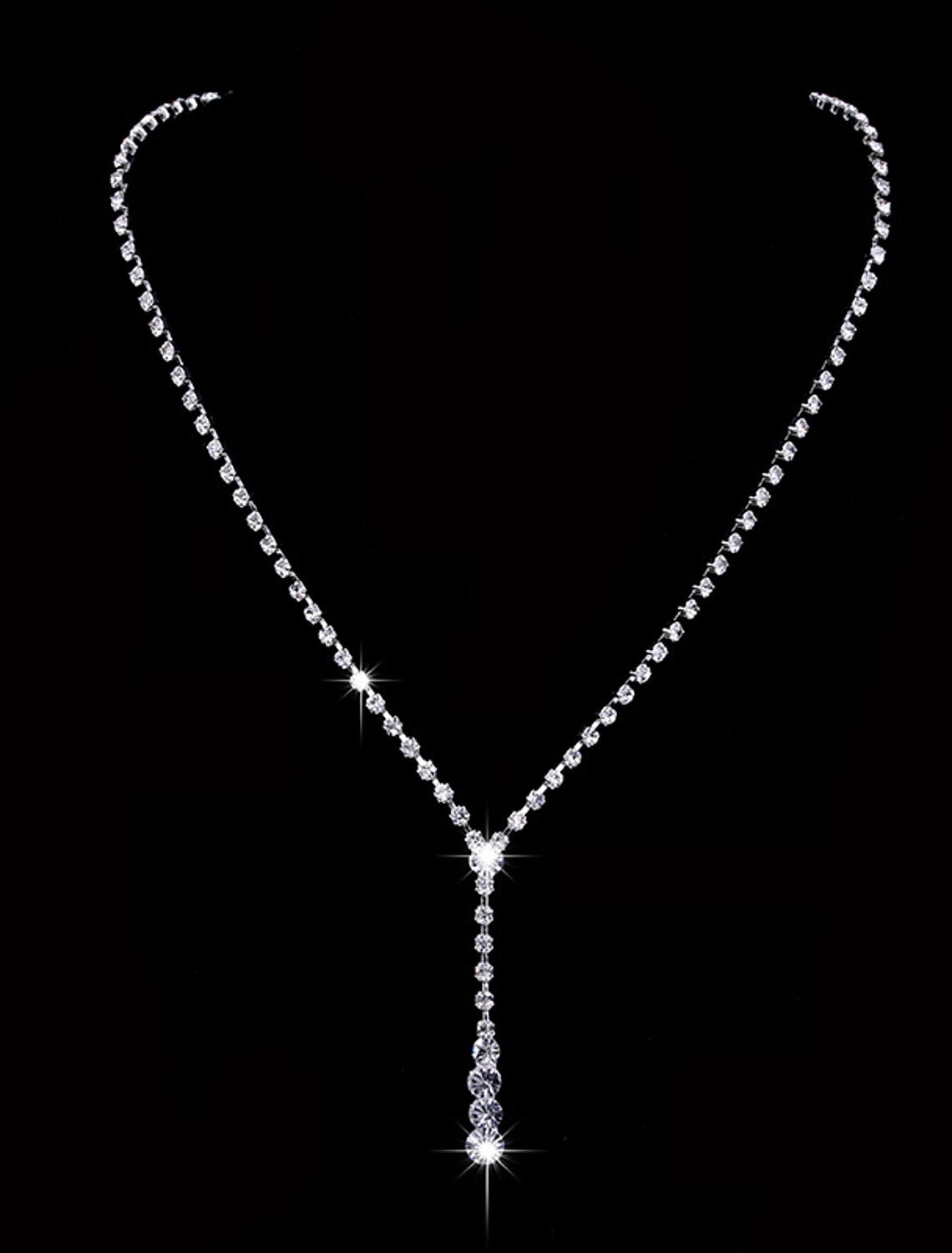 Close-up of AAA Cubic Zirconia drop earrings and matching choker necklace.