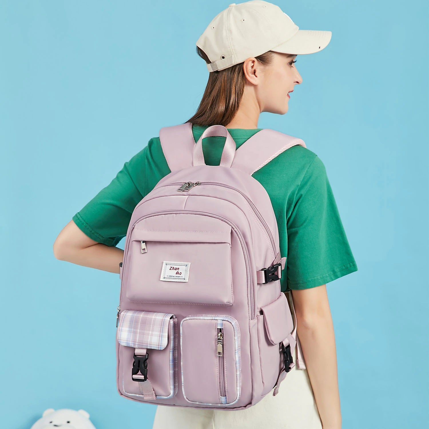 Pink waterproof Oxford backpack with adjustable straps.
