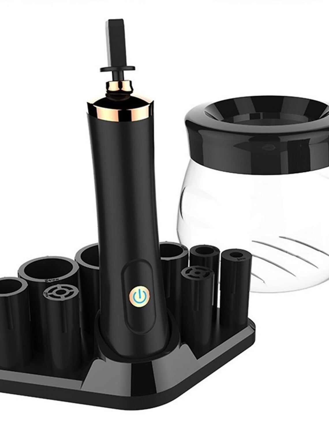 Electric makeup brush cleaner with various brush sizes.