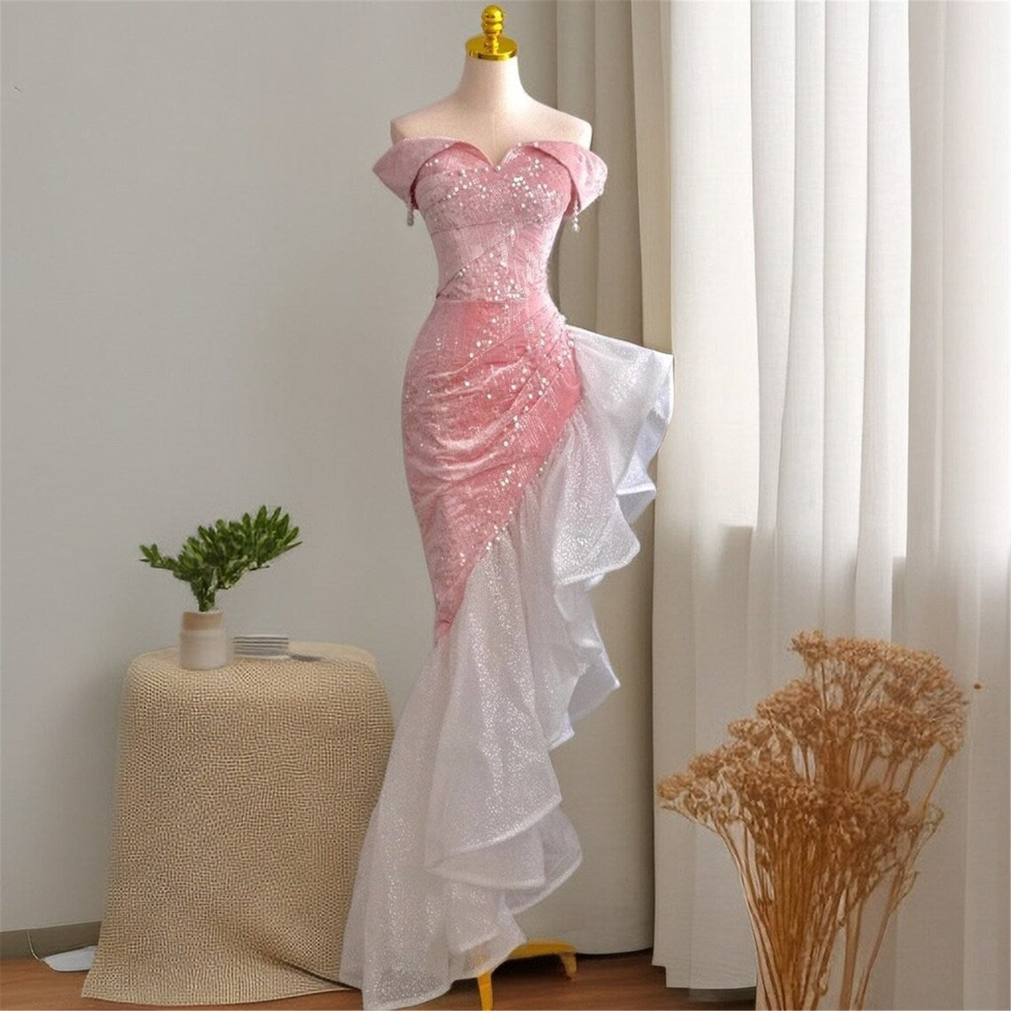 Detail of off-shoulder neckline and pearl sequins on pink BL Dress gown.