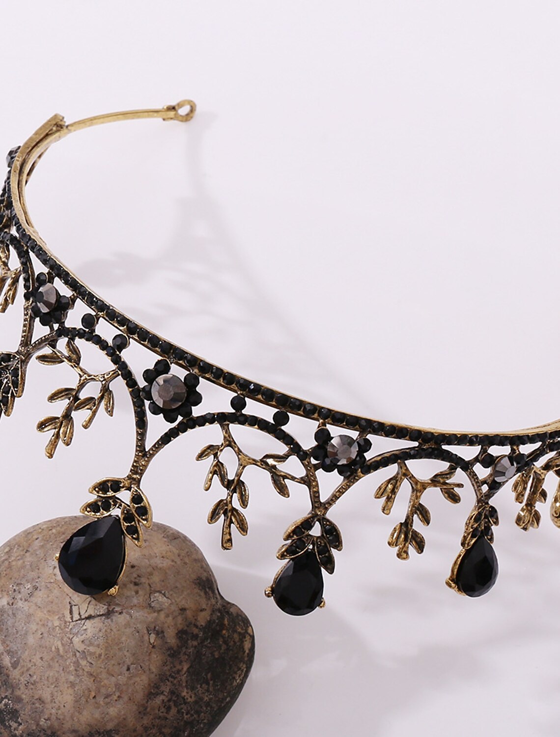 Side view of the jeweled baroque crown.