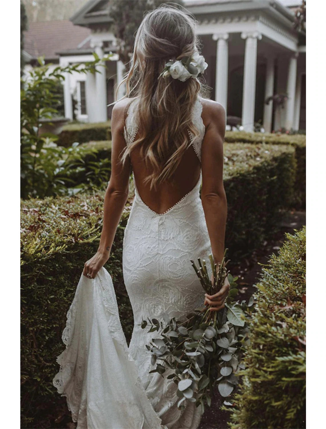 Close-up of lace details and appliques on a bridal dress.