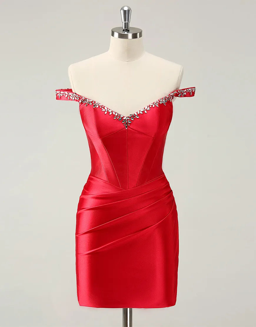 Model wearing a beaded off-shoulder form-fitting maxi homecoming dress, front view.