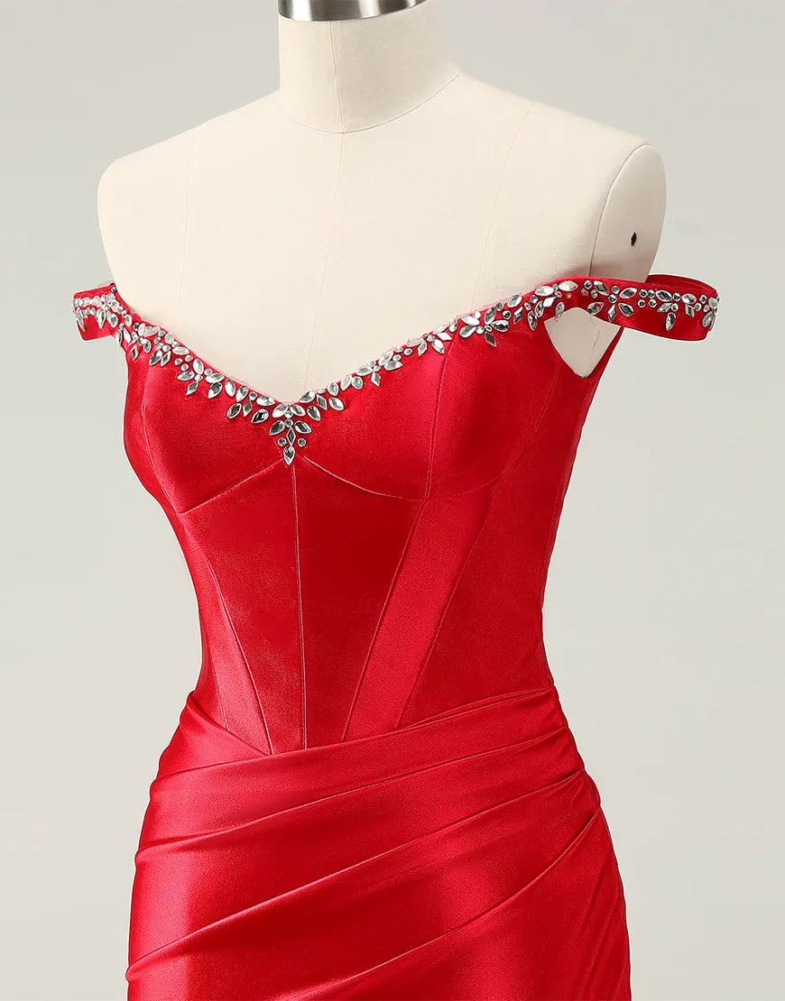 Close-up of the intricate beading on the off-shoulder dress.