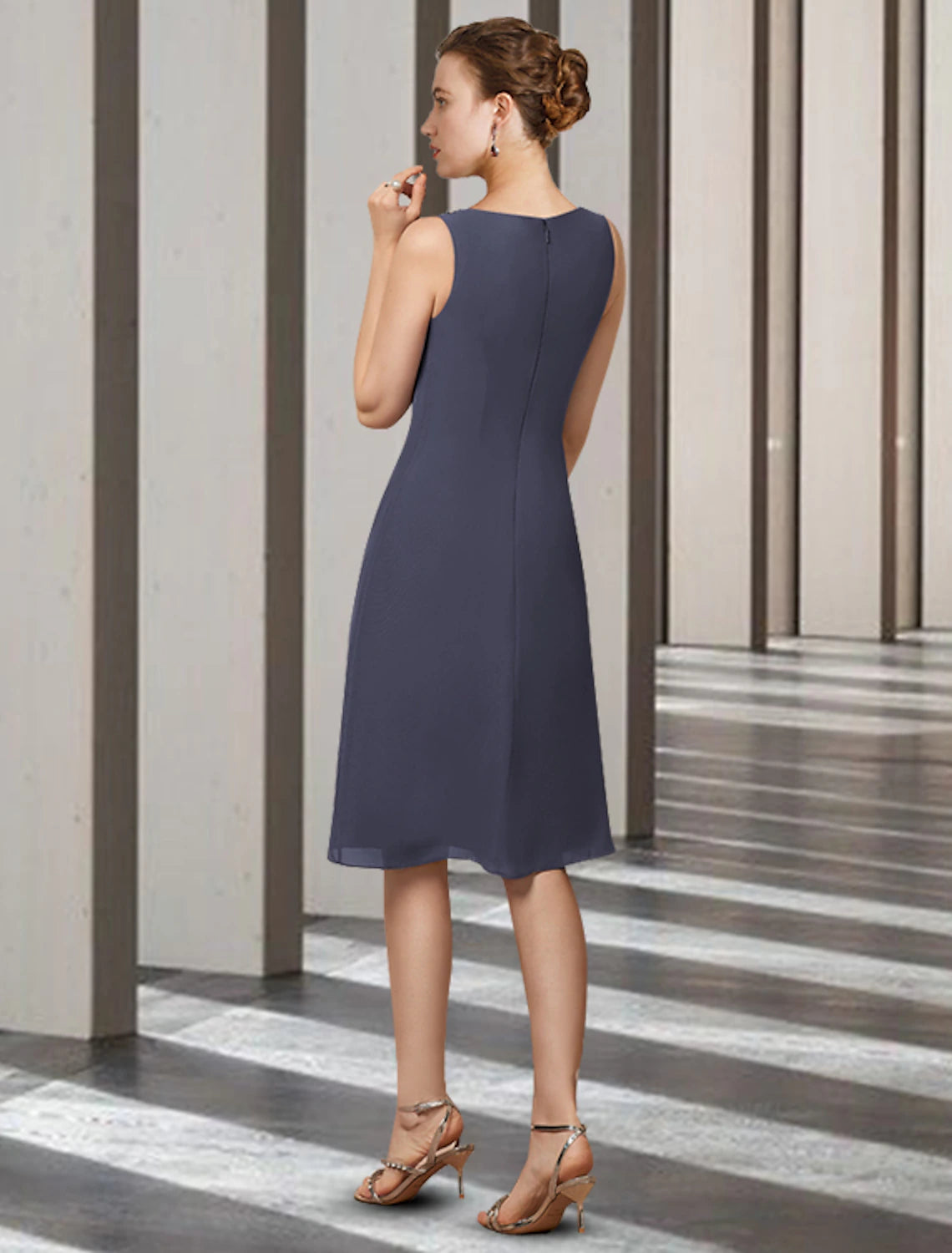 Side view of the two-piece sheath column dress, showcasing its elegant drape.