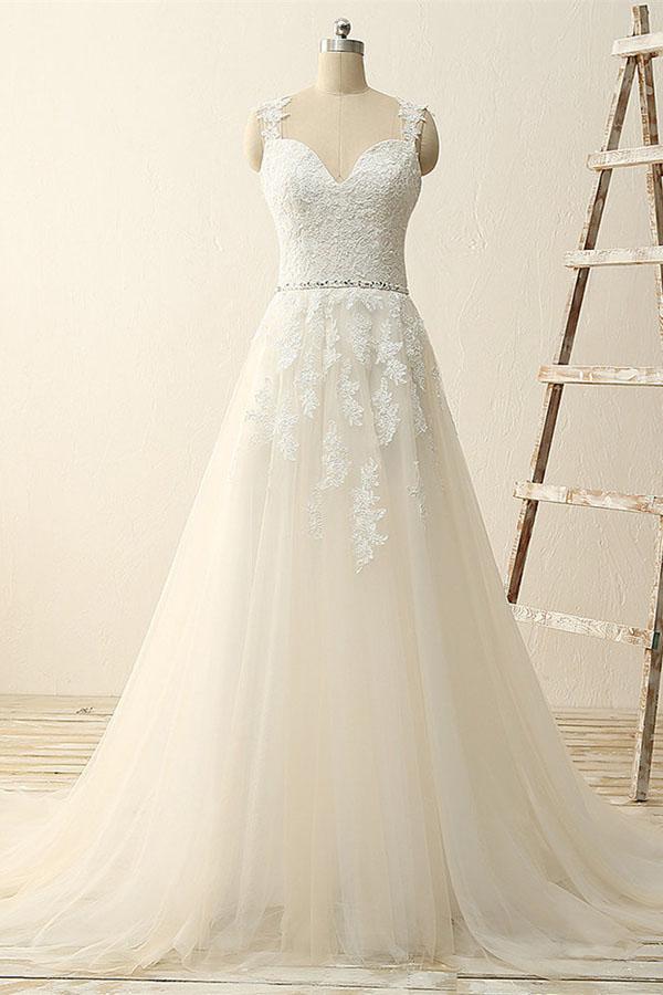 A-Line V-neck wedding dress with lace and appliques.