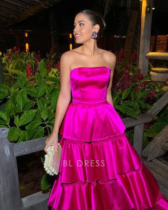 Hot pink strapless A-line tiered satin dress from a different angle.