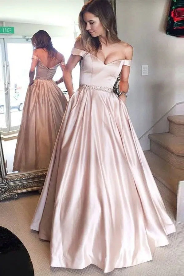 Blush Pink Off The Shoulder Satin Ball Gown Prom Dress with Beaded Waist and Pockets for Formal Events and Prom Nights