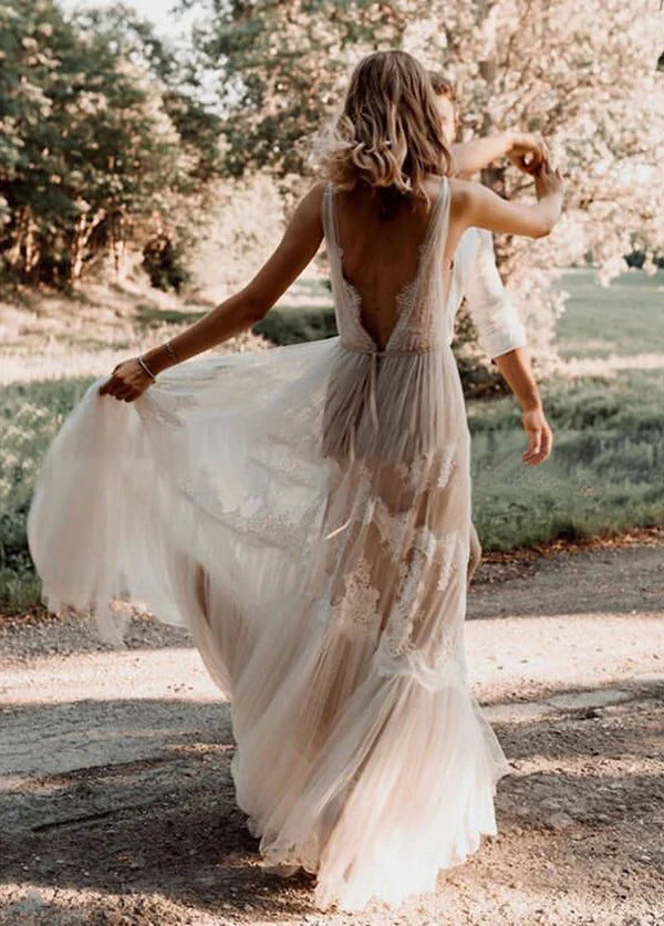 Close-up of the backless detail on the Bohemian wedding dress.