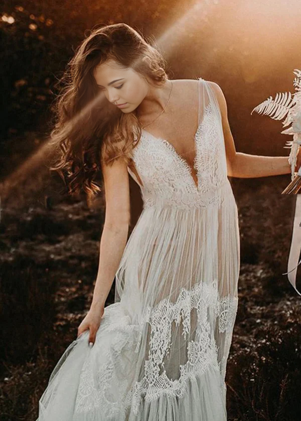 Side view of the flowing A-line skirt of the bridal gown.