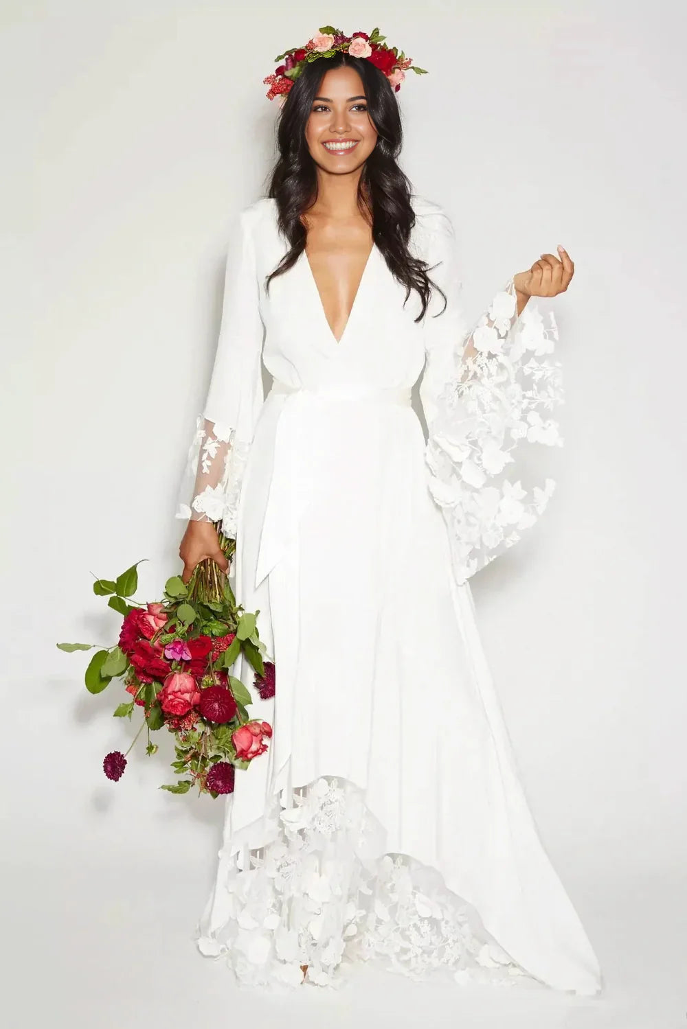 Bohemian long sleeve V-neck lace wedding dress, front view.