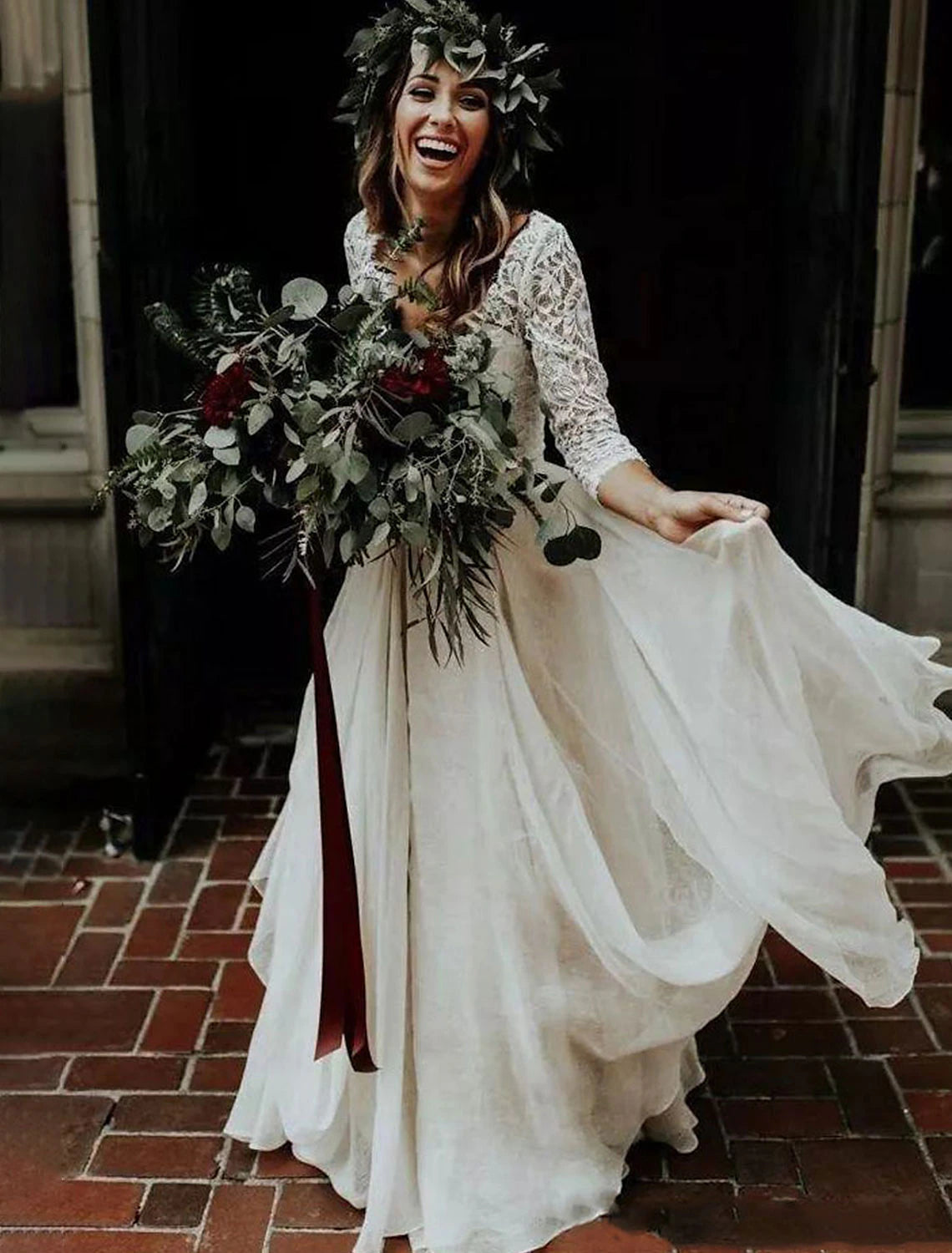 Bohemian chiffon ball gown wedding dress with V-neck and 3/4 sleeves.