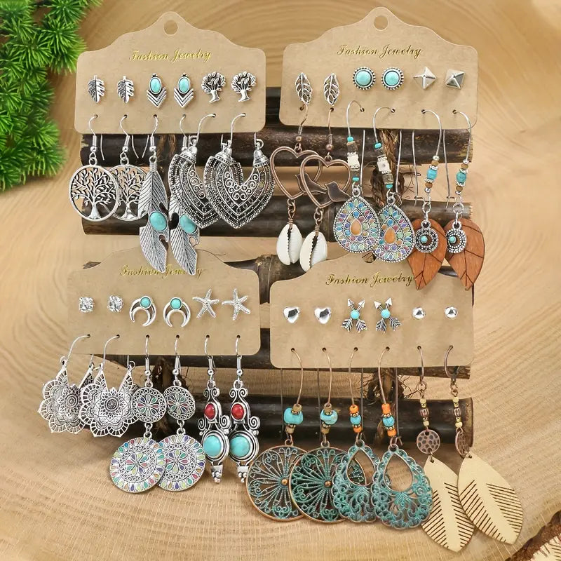 Close-up of various bohemian dangle earrings with turquoise stones.