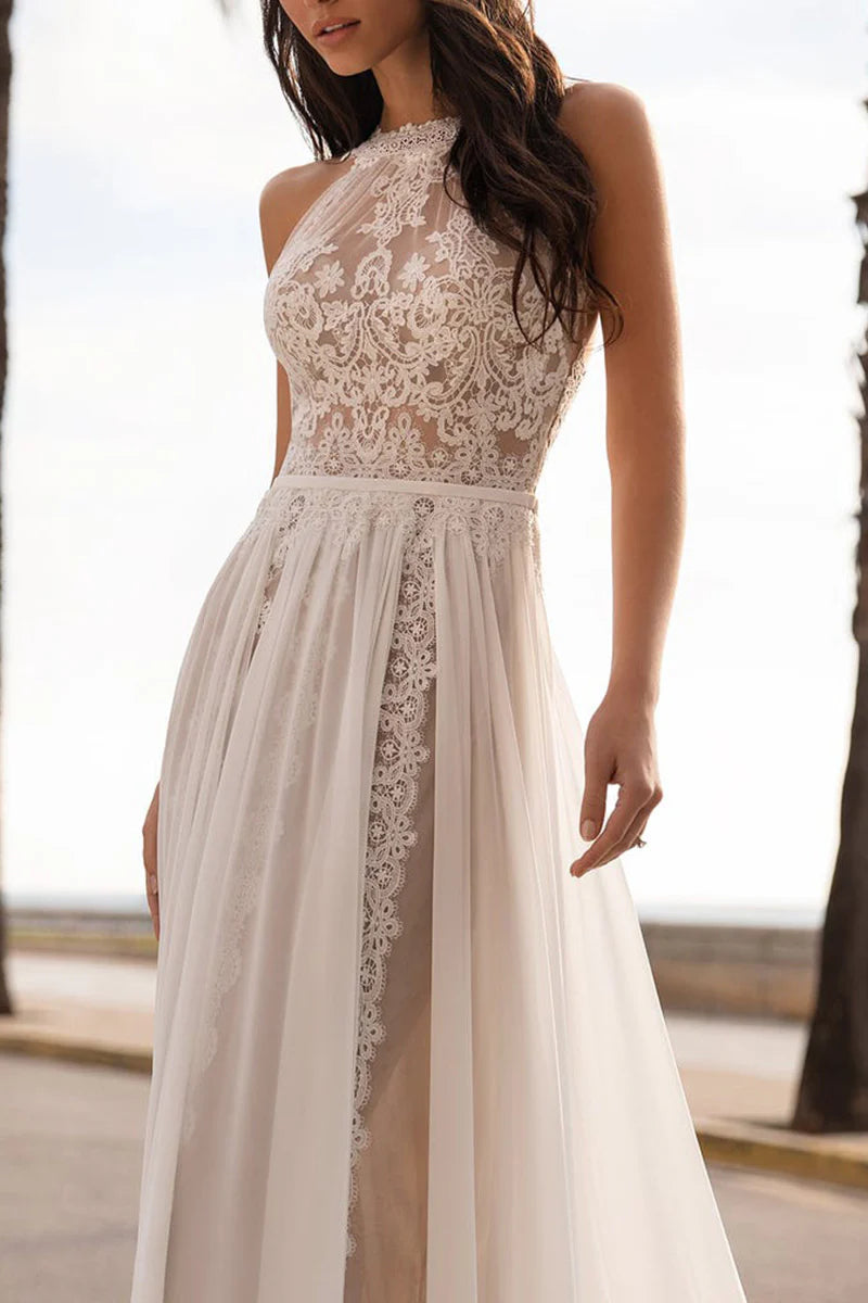 Back view of a Boho wedding dress, showing the lace details and elegant train.