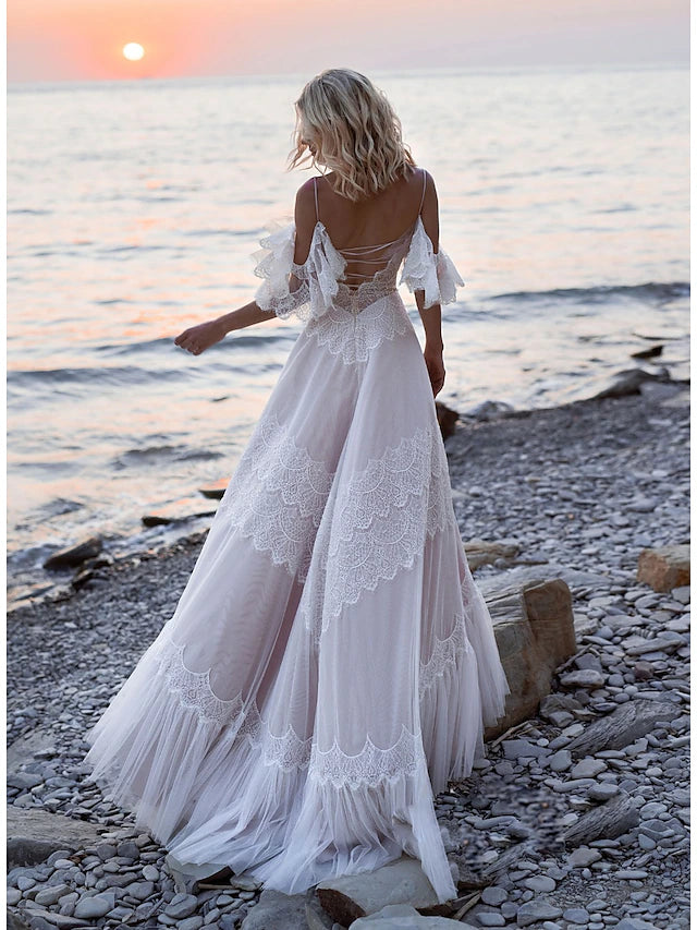 Side view of boho A-line lace wedding dress with V-neck and short sleeves.