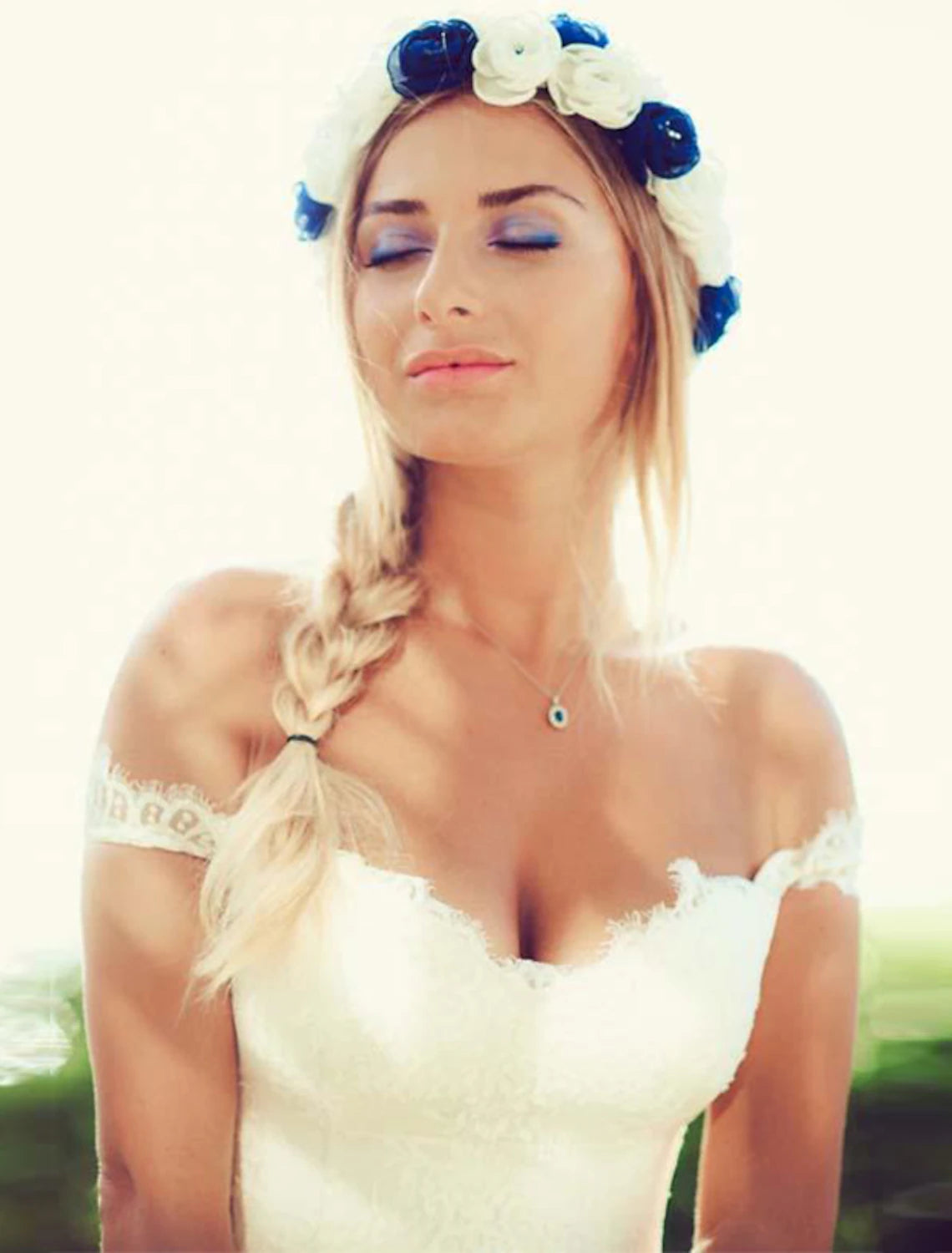 Back view of a white A-line bridal gown with court train.