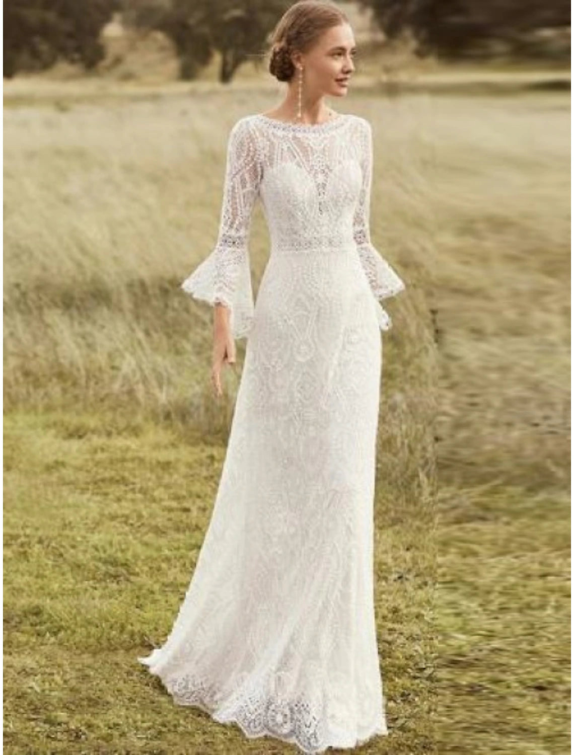 Boho A-line lace wedding dress with scoop neck and long sleeves.