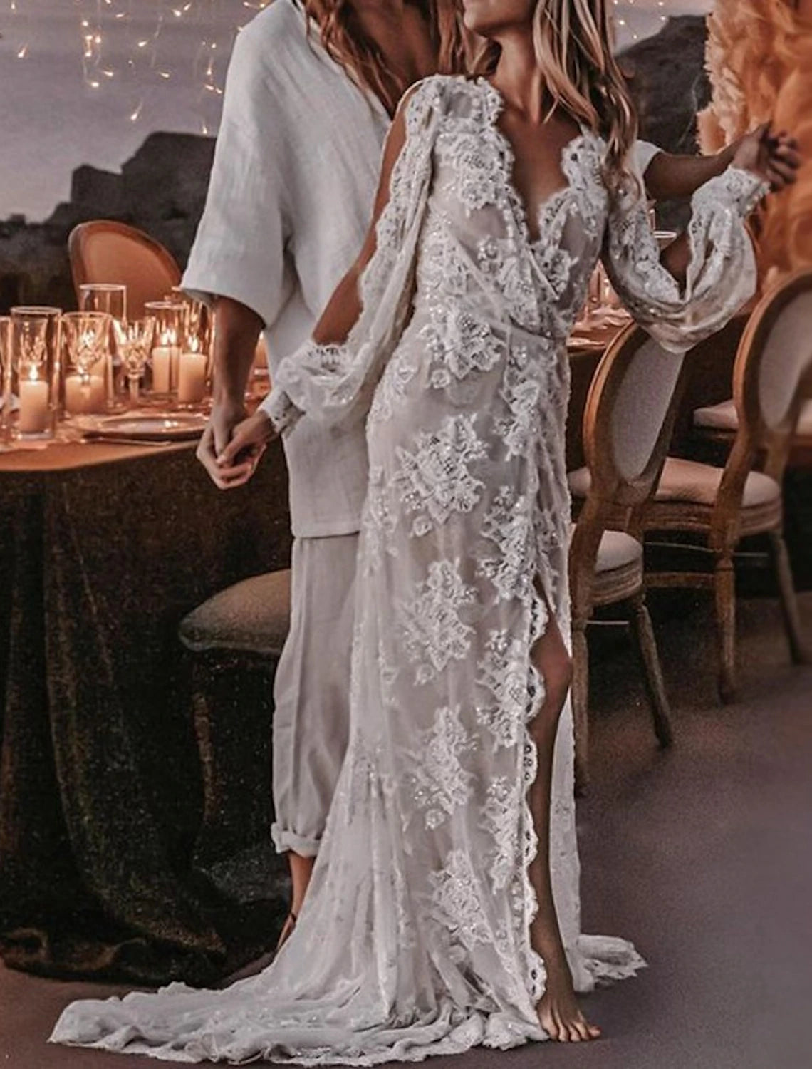 Back view of the boho A-line wedding gown, showing the sweep train.