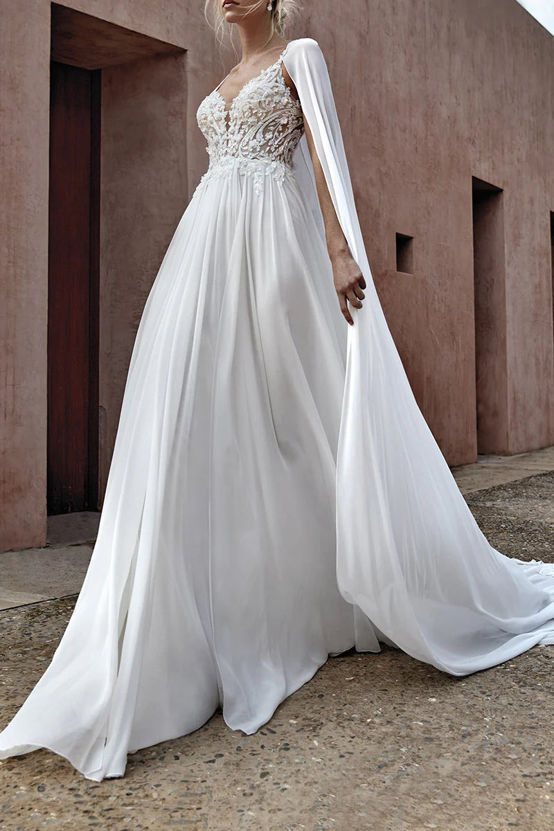Boho A-line V-neck wedding dress with lace appliques, full view.