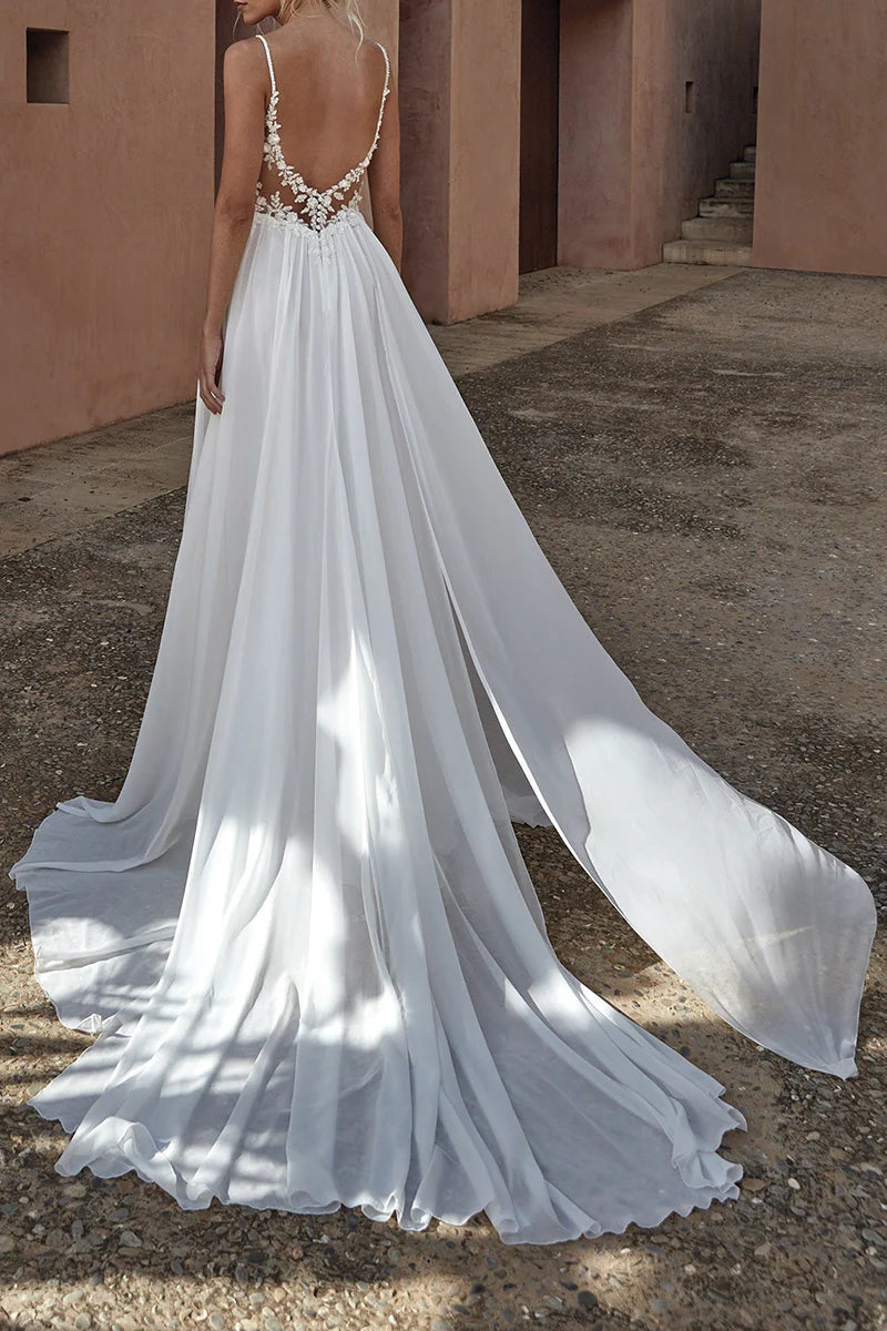 Back view of the A-line wedding dress showing lace details.