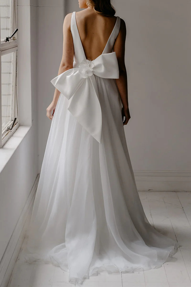 Detail of the simple open back design on the wedding gown.
