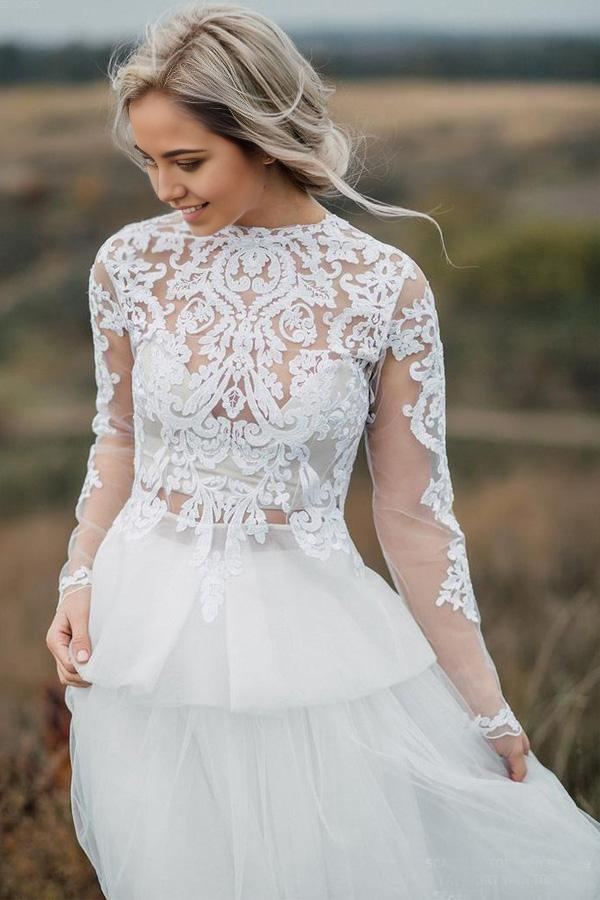 Boho A-line lace wedding gown with V-neck and V-back.