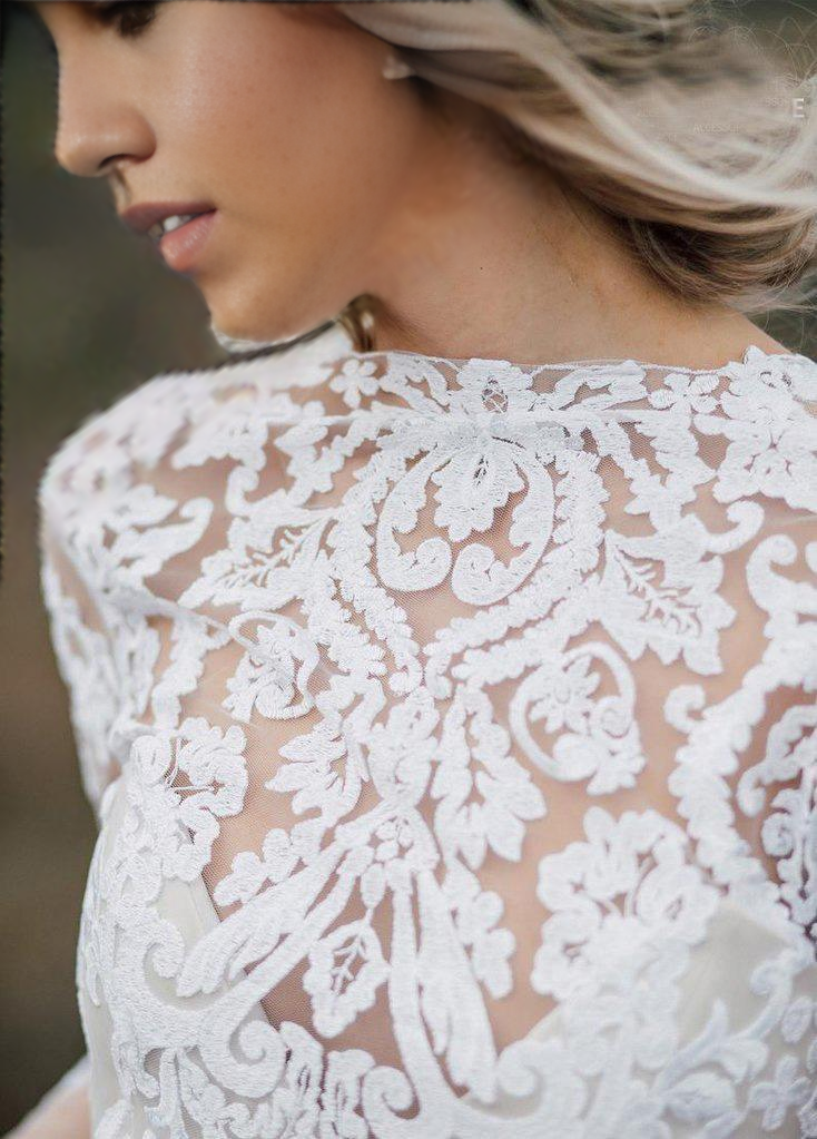 Full view of the sleeveless A-line wedding dress separates.
