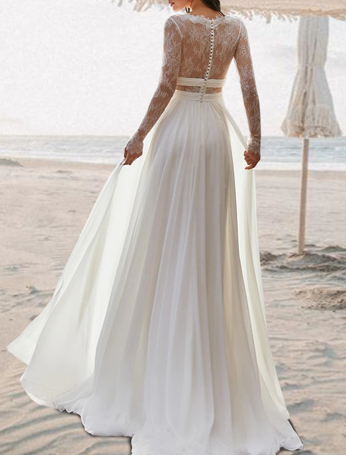 Model wearing a Boho Beach A-Line wedding dress with an open back and V-neck.