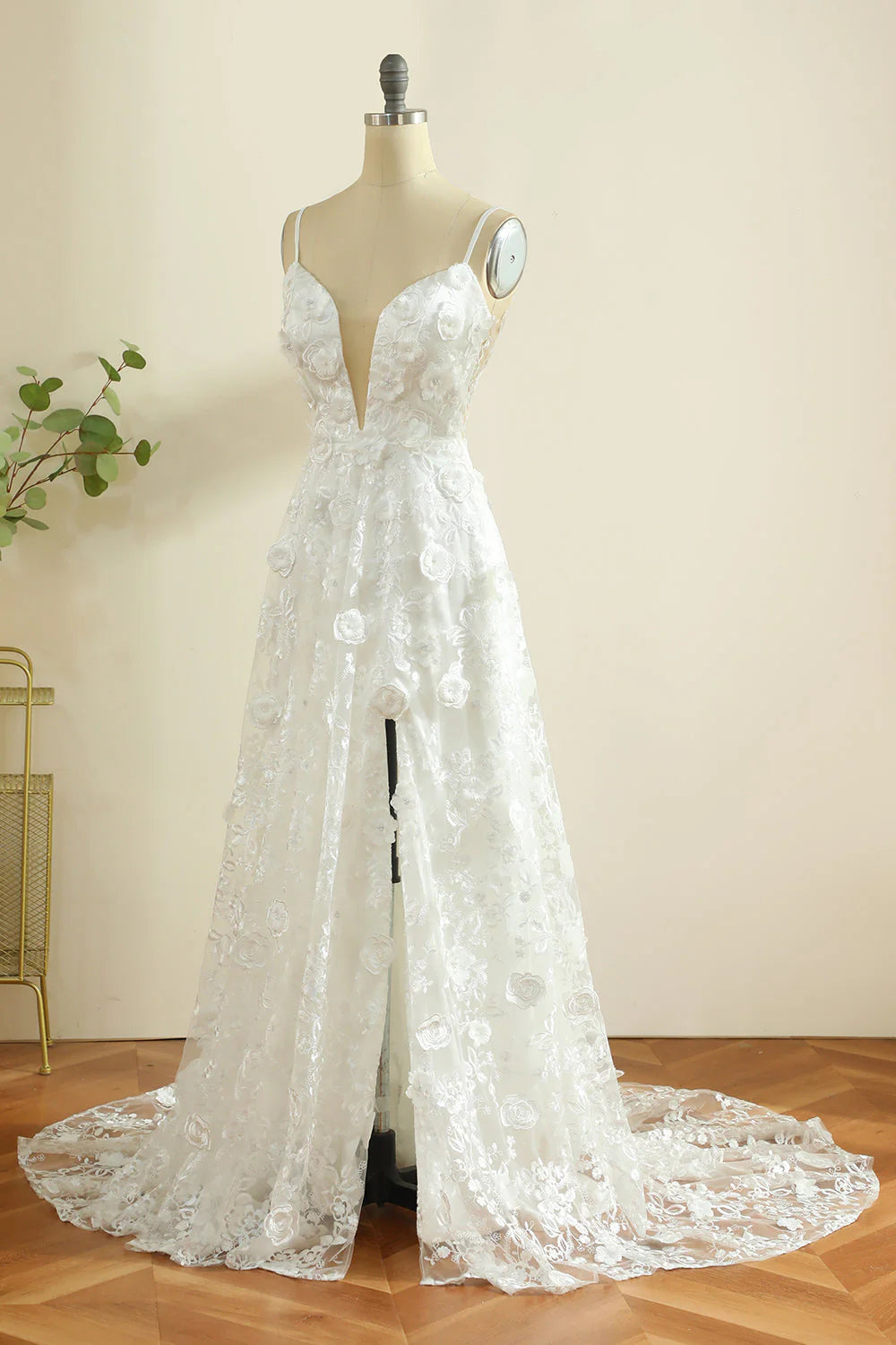 Back view of the white spaghetti strap boho wedding gown.