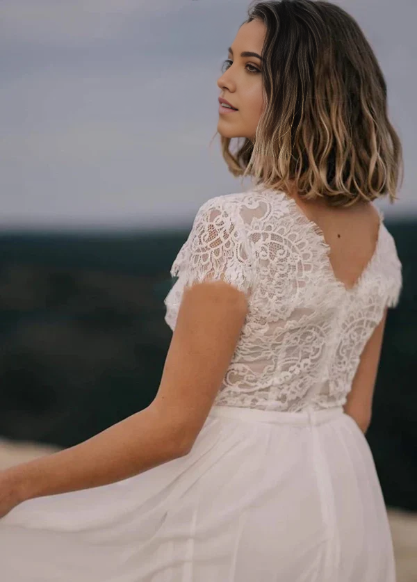 Side view of the A-line chiffon wedding dress, highlighting its elegant silhouette.
