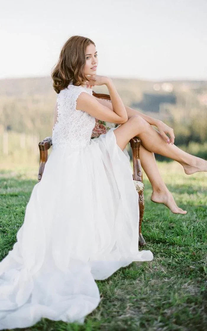Full view of the Boho Lace A-Line Wedding Dress with V-neck and cap sleeves, showing keyhole back.